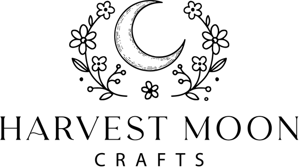 Logo of Harvest Moon Crafts with a moon and floral design on a white background